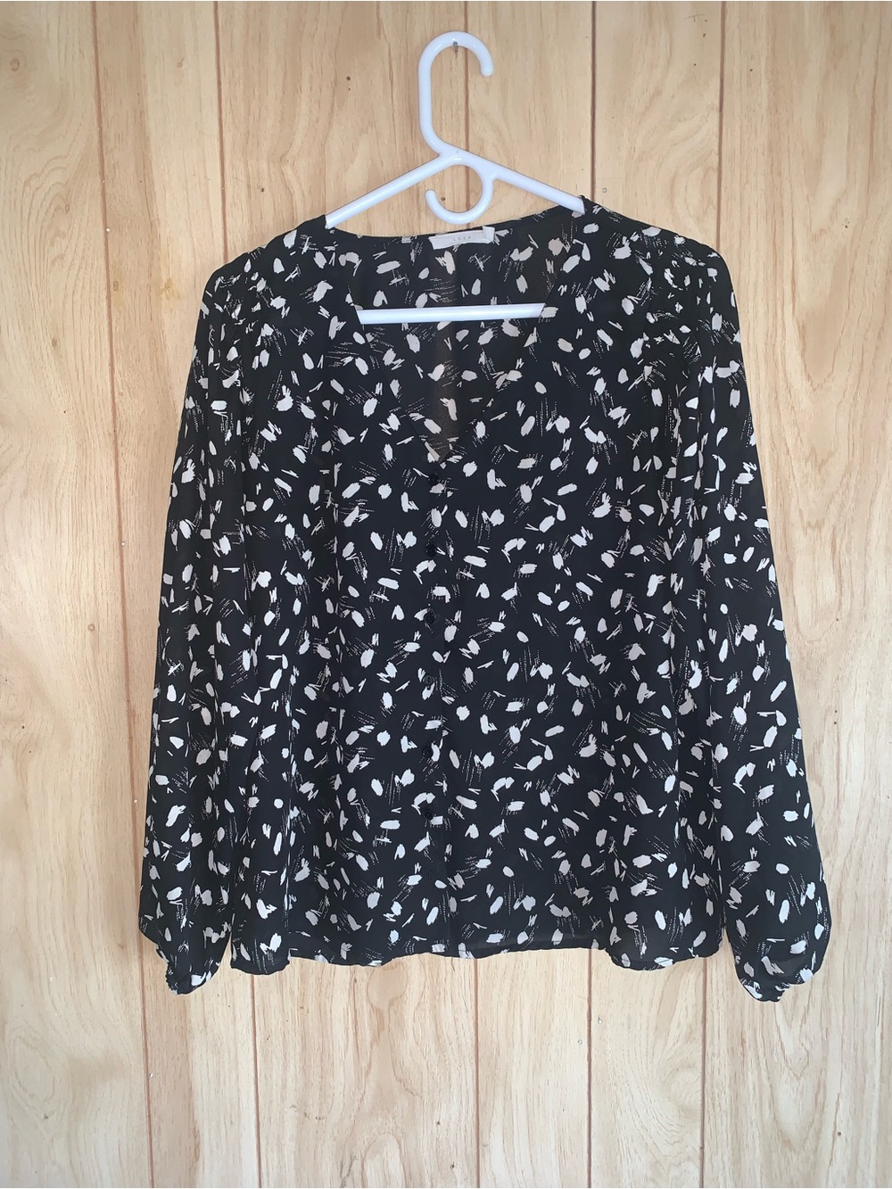 Lush Black Blouse with White Abstract Print